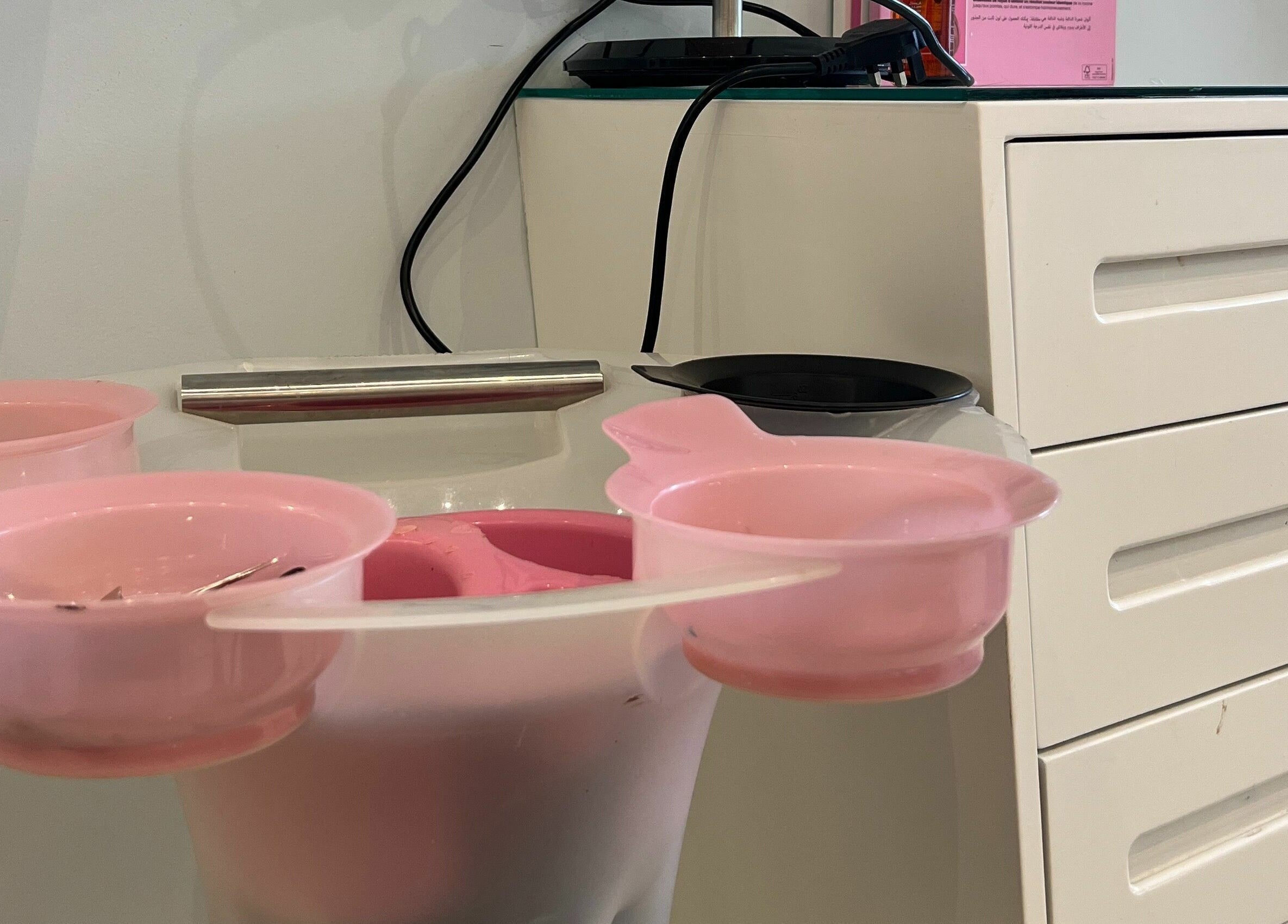 Pink bowls and tools for hair treatment at Aime Toi, Riyadh, Riyadh Province, SA