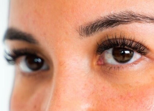 Close-up of beautifully groomed eyebrows and lashes at The Cocoon CBR in Phillip, Australian Capital Territory, AU.