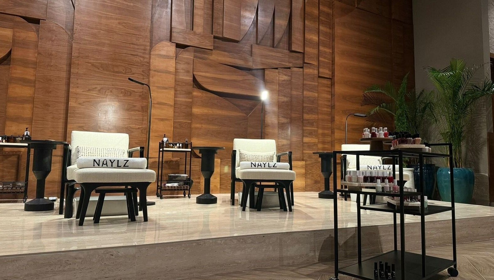 Luxurious seating at Naylz Spa I نيلز سبا in Riyadh, Riyadh Province, SA, with elegant decor and nail products.