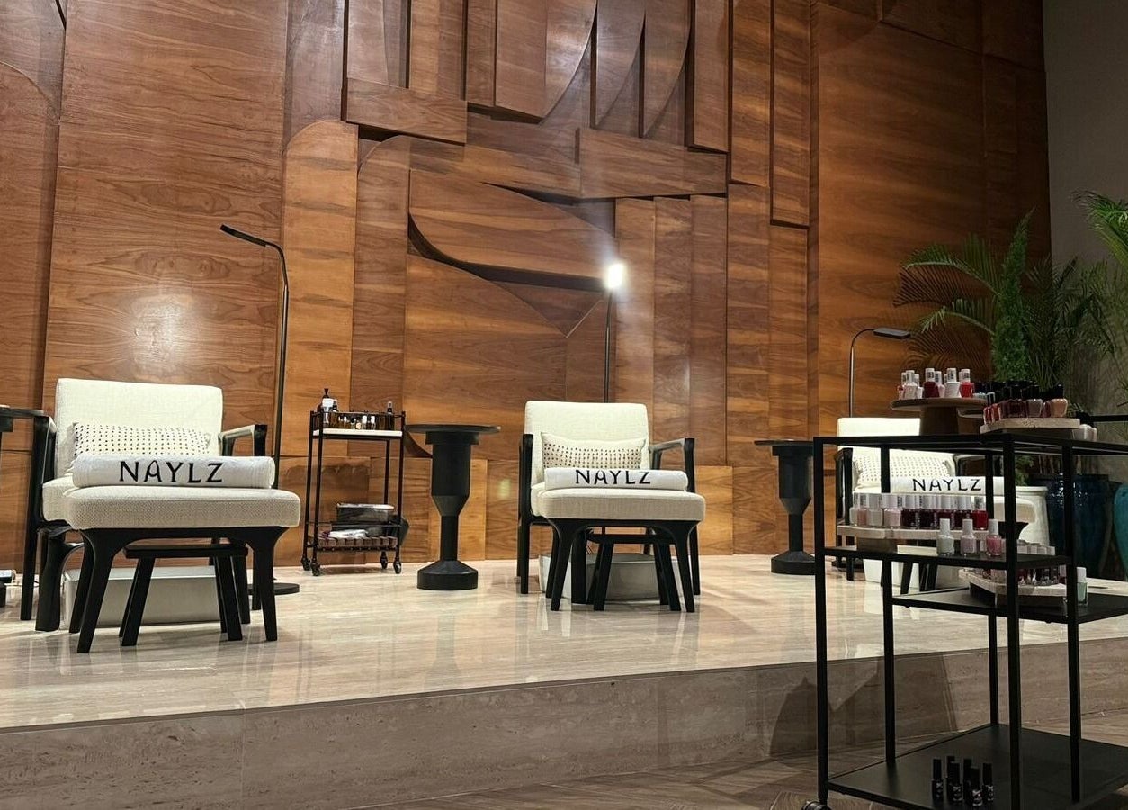 Luxurious seating at Naylz Spa I نيلز سبا in Riyadh, Riyadh Province, SA, with elegant decor and nail products.