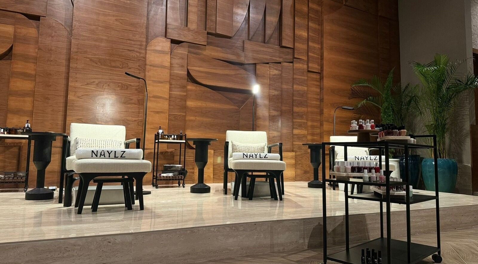 Luxurious seating at Naylz Spa I نيلز سبا in Riyadh, Riyadh Province, SA, with elegant decor and nail products.