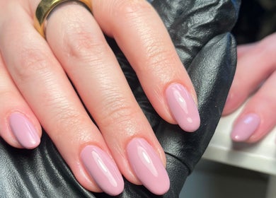 Elegant pink manicure at Mabel Studio, Blantyre, Scotland, GB showcasing expertly done nails.