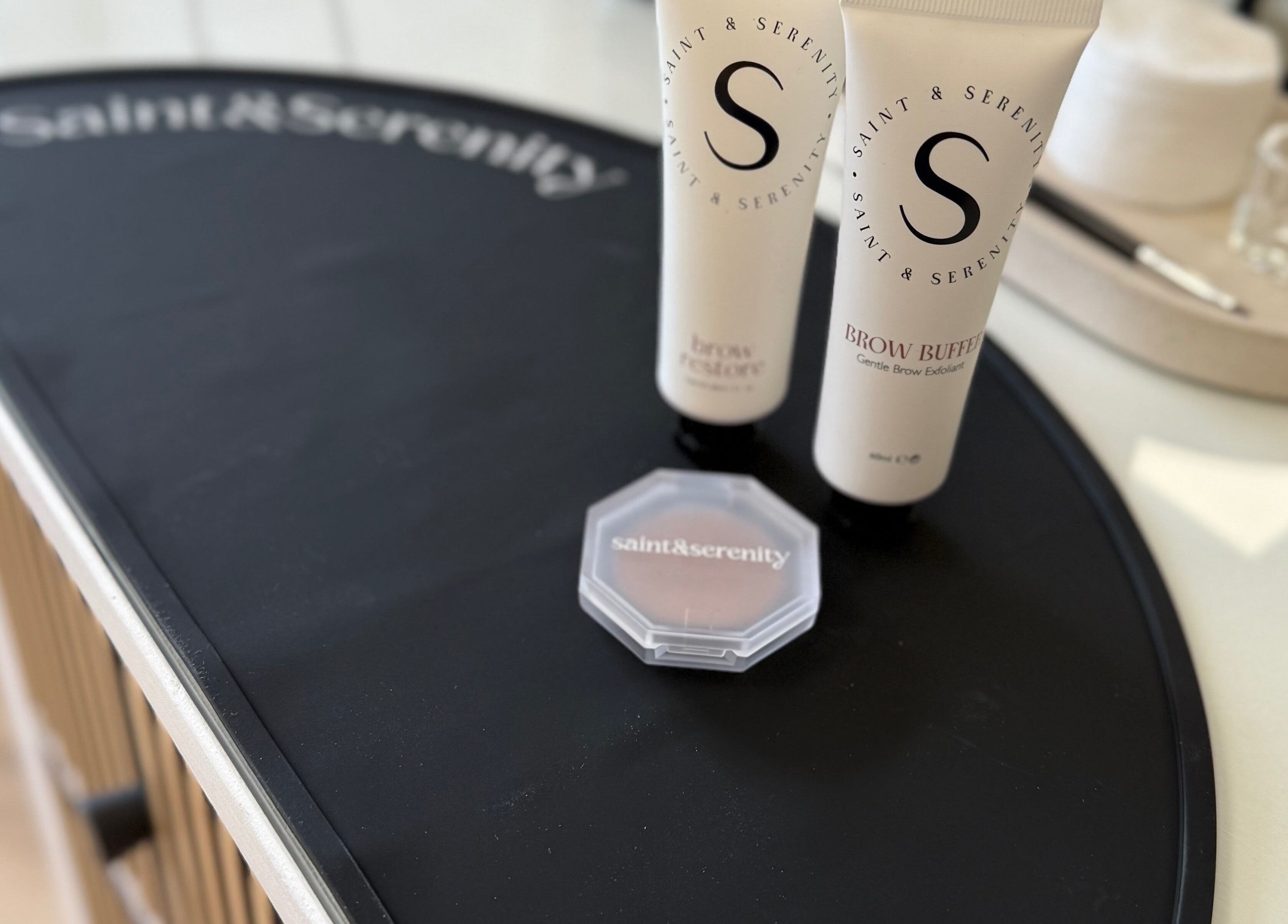 Beauty products at Mabel Studio, Blantyre, Scotland, GB, highlighting Saint & Serenity branding.
