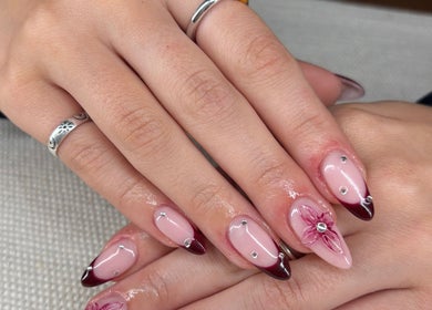 Stylish nail art with maroon tips at The Beauty Drop Norwich, Blofield, England, GB.