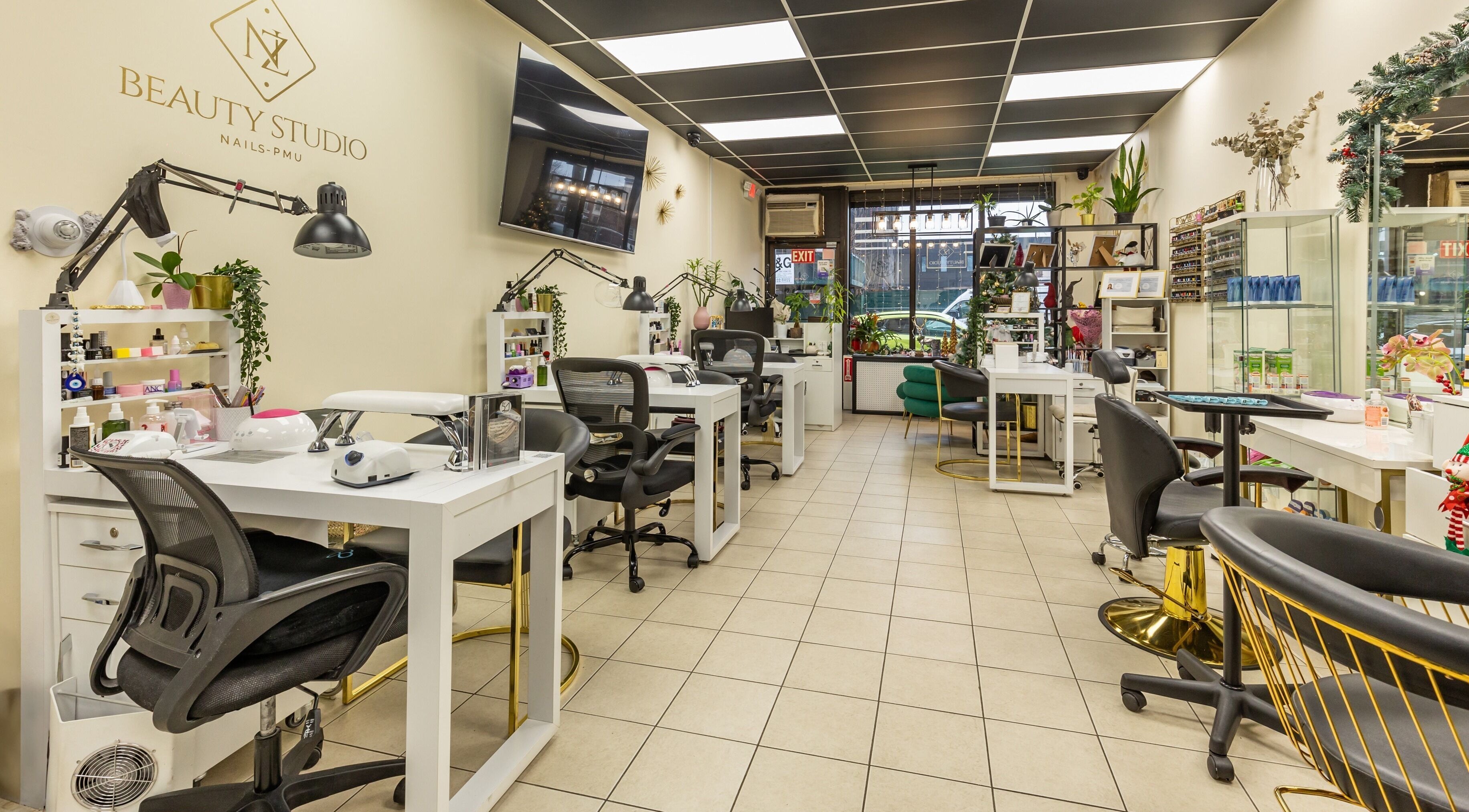 Luxurious nail stations at NZ Beauty Studio, New York, New York, US, showcasing modern design and comfort.