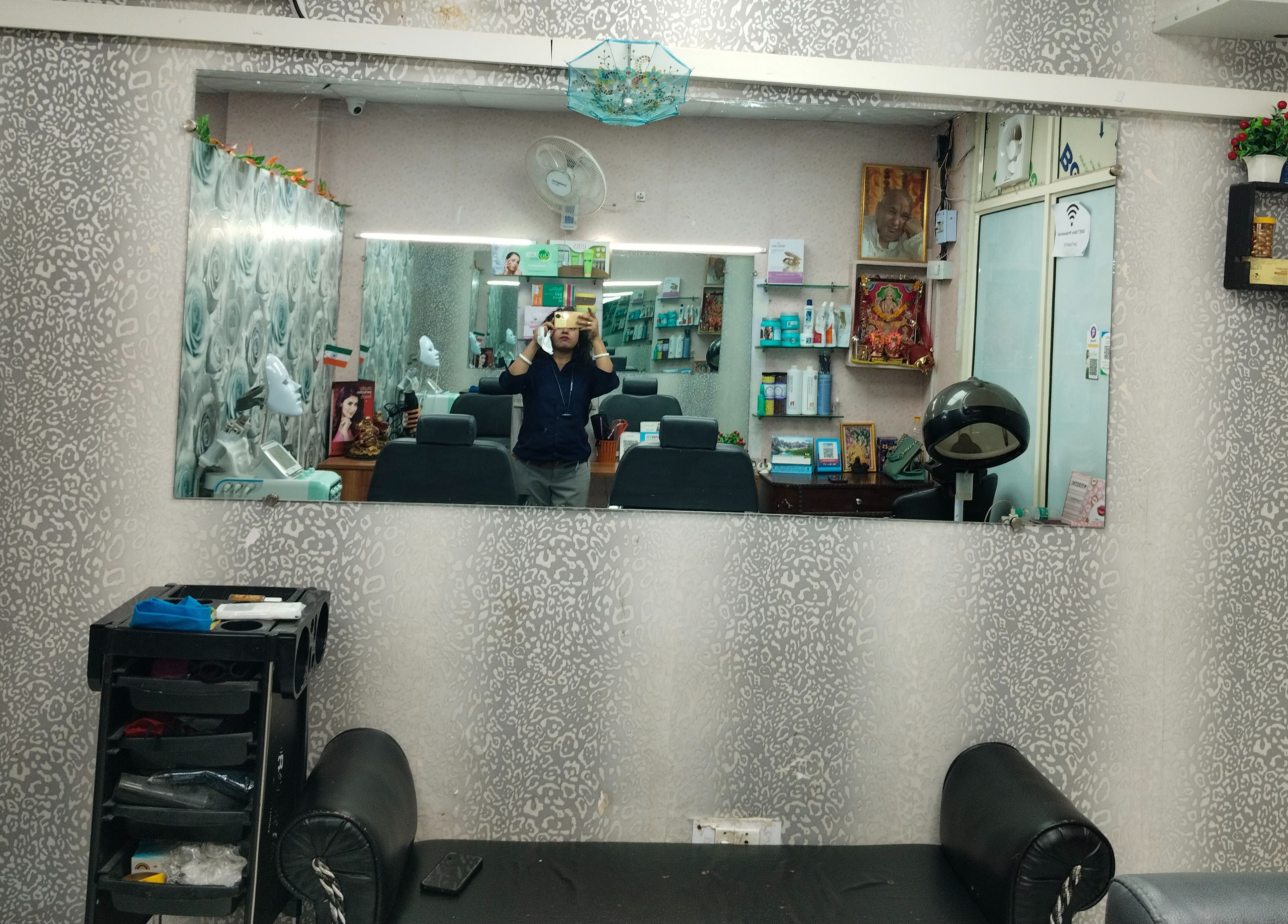 Inside view of Geet Salon Professional (for Ladies) Noida, Uttar Pradesh, IN with mirrors and elegant decor.