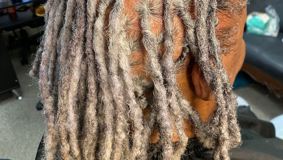 Detailed view of silvery dreadlocks at TBH Tha Black Hippie in Oroville, California, US.