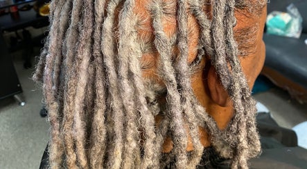 Detailed view of silvery dreadlocks at TBH Tha Black Hippie in Oroville, California, US.