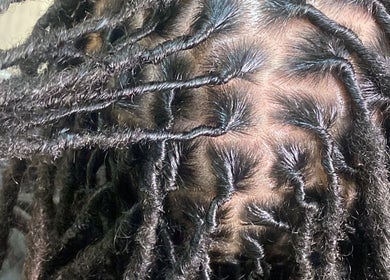 Detailed braid styling at TBH Tha Black Hippie in Oroville, California, US.