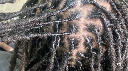 Detailed braid styling at TBH Tha Black Hippie in Oroville, California, US.