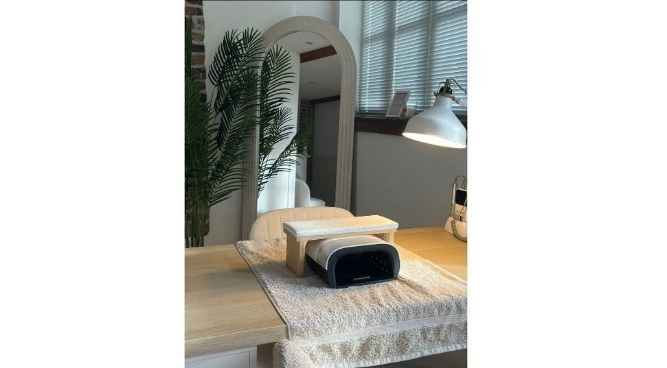 Calm manicure station at Belles Beauty Therapy in Ormskirk, GB, ready for clients with ambient lighting.