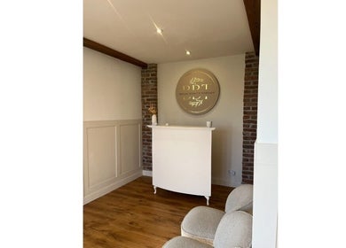 Reception area of Belles Beauty Therapy in Ormskirk, GB with elegant decor and welcoming ambiance.