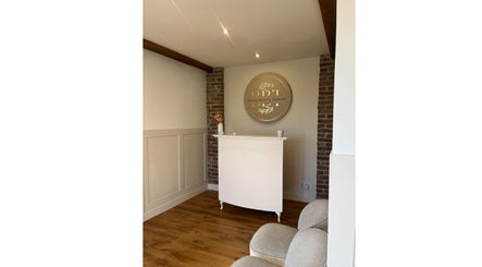 Reception area of Belles Beauty Therapy in Ormskirk, GB with elegant decor and welcoming ambiance.