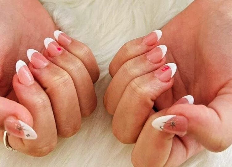 Elegant French manicure with nail art at Golden Nail Bar, Subang Jaya, Selangor, MY.