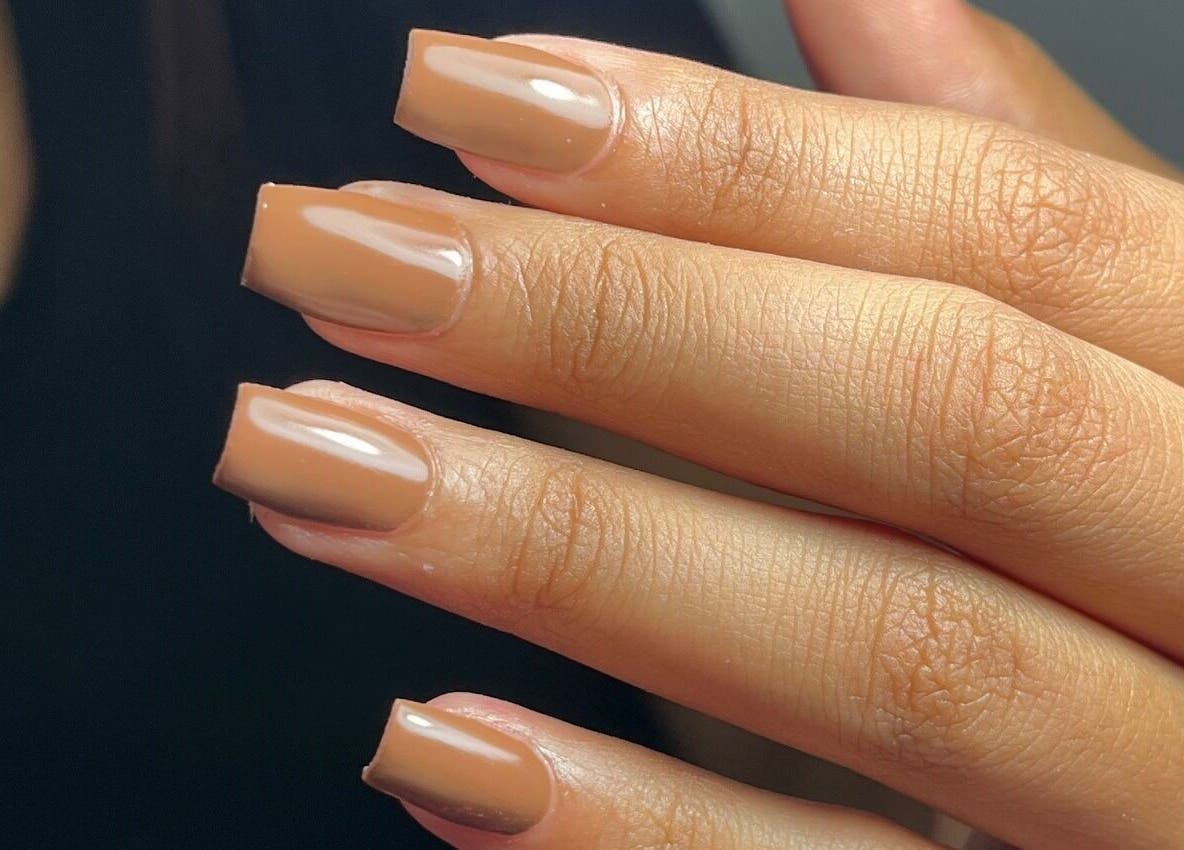 Elegant beige manicure at Nailvault by Chels, Cape Town, Western Cape, ZA. Perfect nail art for any occasion.