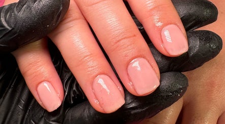 Detailed view of manicured nails with a soft pink polish at Nūse Aesthetics, Nottingham, England, GB.