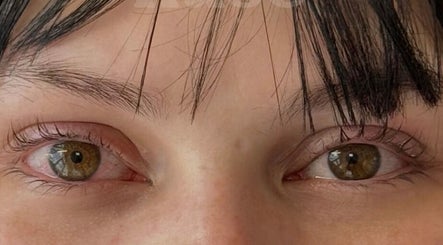 Close-up of beautifully shaped eyebrows and lashes at Nūse Aesthetics, Nottingham, England, GB.