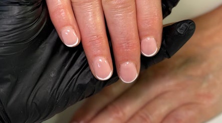 Elegant French manicure at Nūse Aesthetics, Nottingham, England, GB, showcasing precision and style.