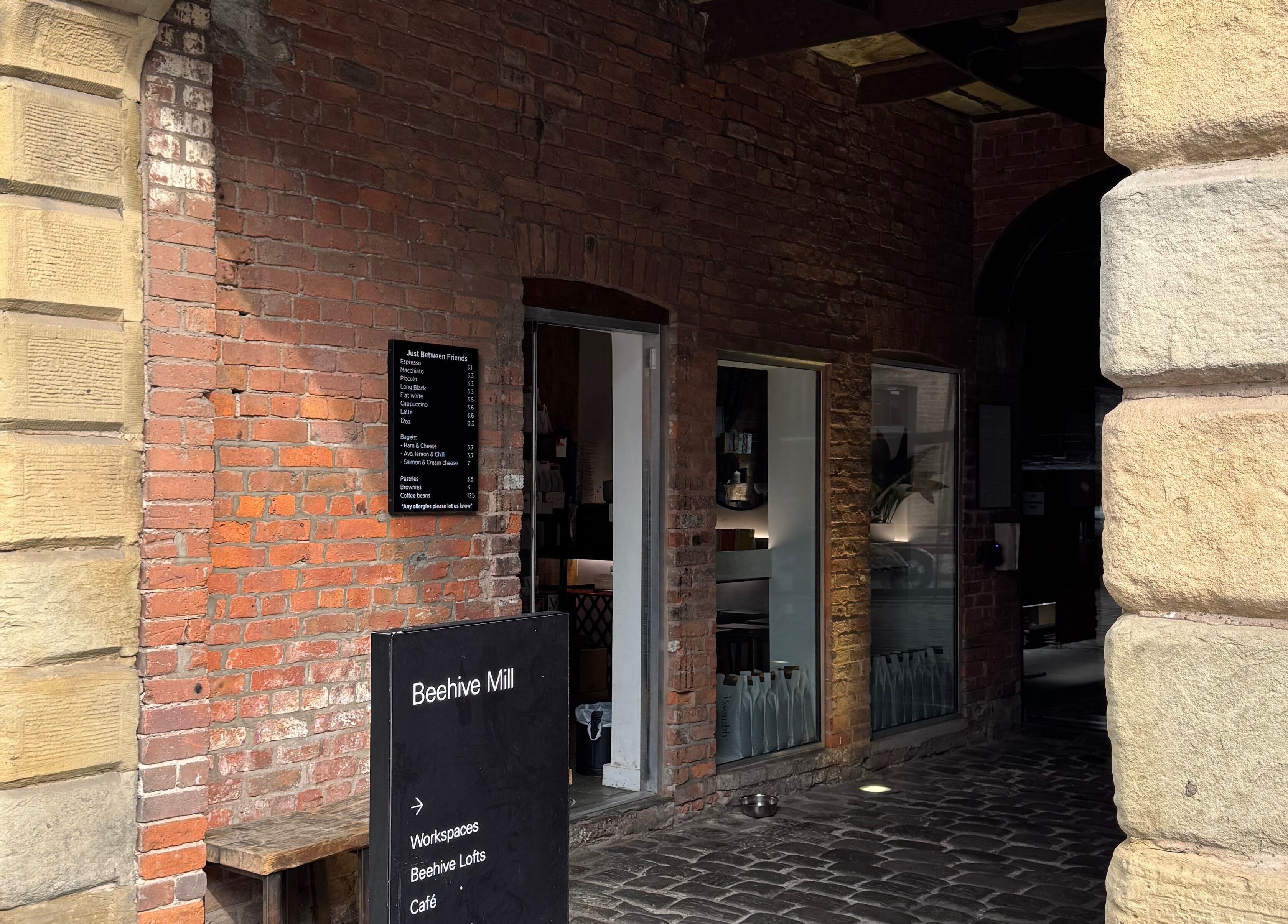 Entrance to Griff’s Gel Studio in Beehive Mill, Manchester, showcasing historic brick architecture in England, GB.
