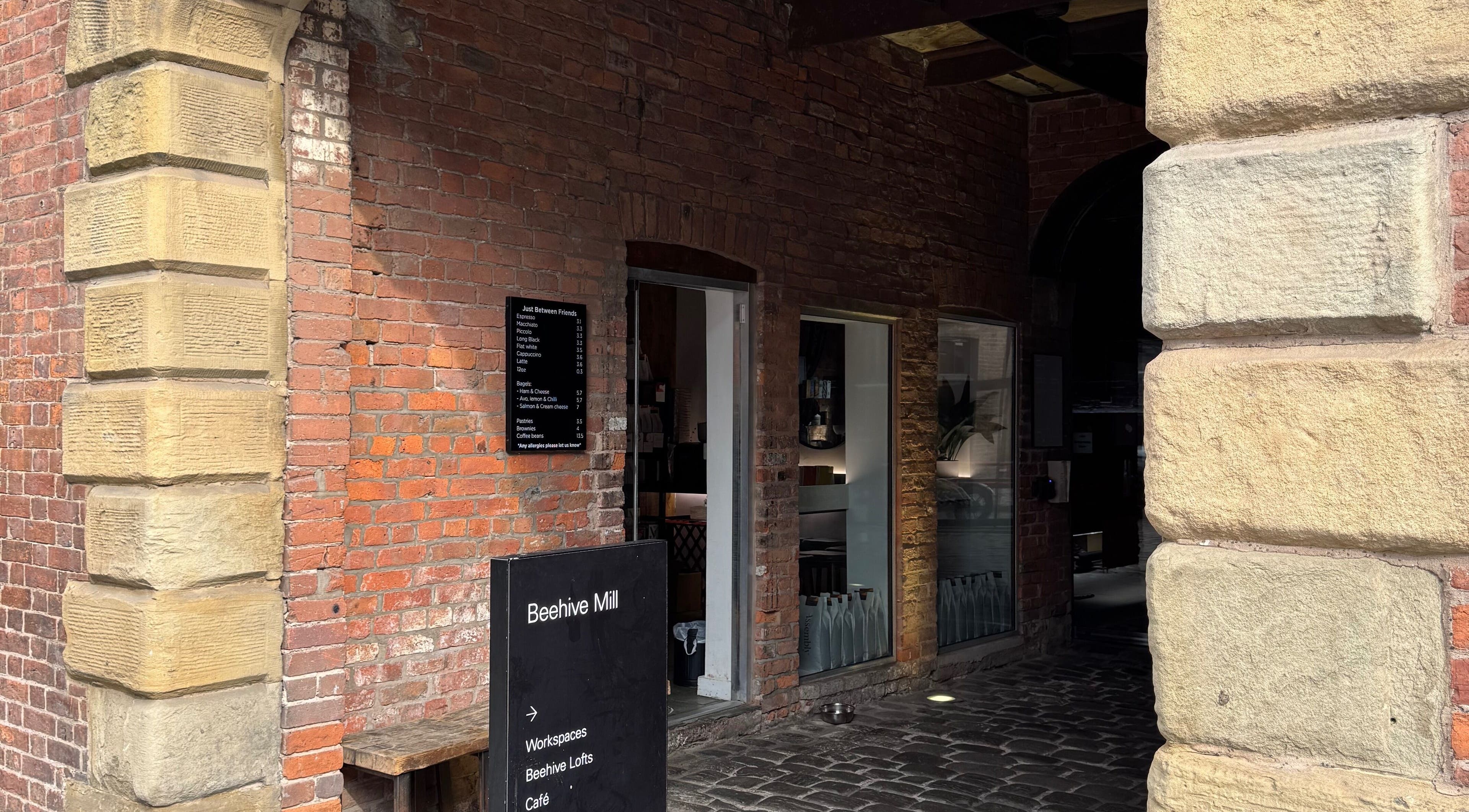 Entrance to Griff’s Gel Studio in Beehive Mill, Manchester, showcasing historic brick architecture in England, GB.