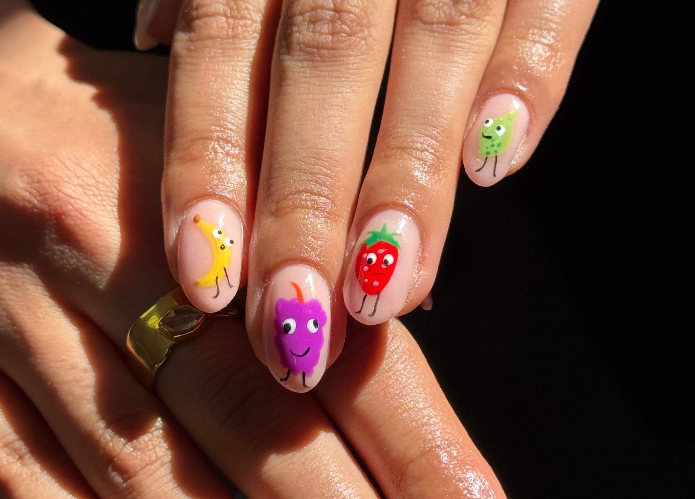 Colorful fruit-themed nail art design at Griff’s Gel Studio - Manchester, located in Manchester, England, GB.