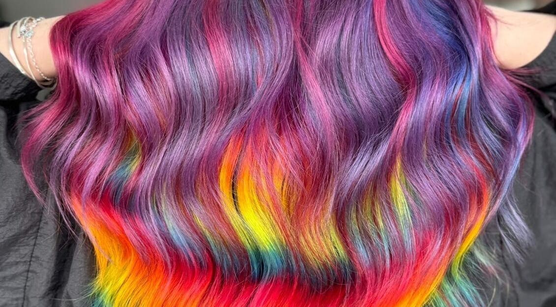 Vibrant rainbow hair styling at The Lavender Loft, Cardiff, Wales, GB.