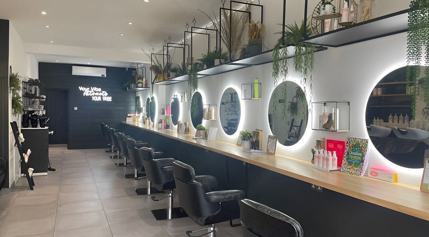 Chic salon interior of Nouvelles Collective - Kelly Favell, Epsom, England, GB featuring modern styling chairs.