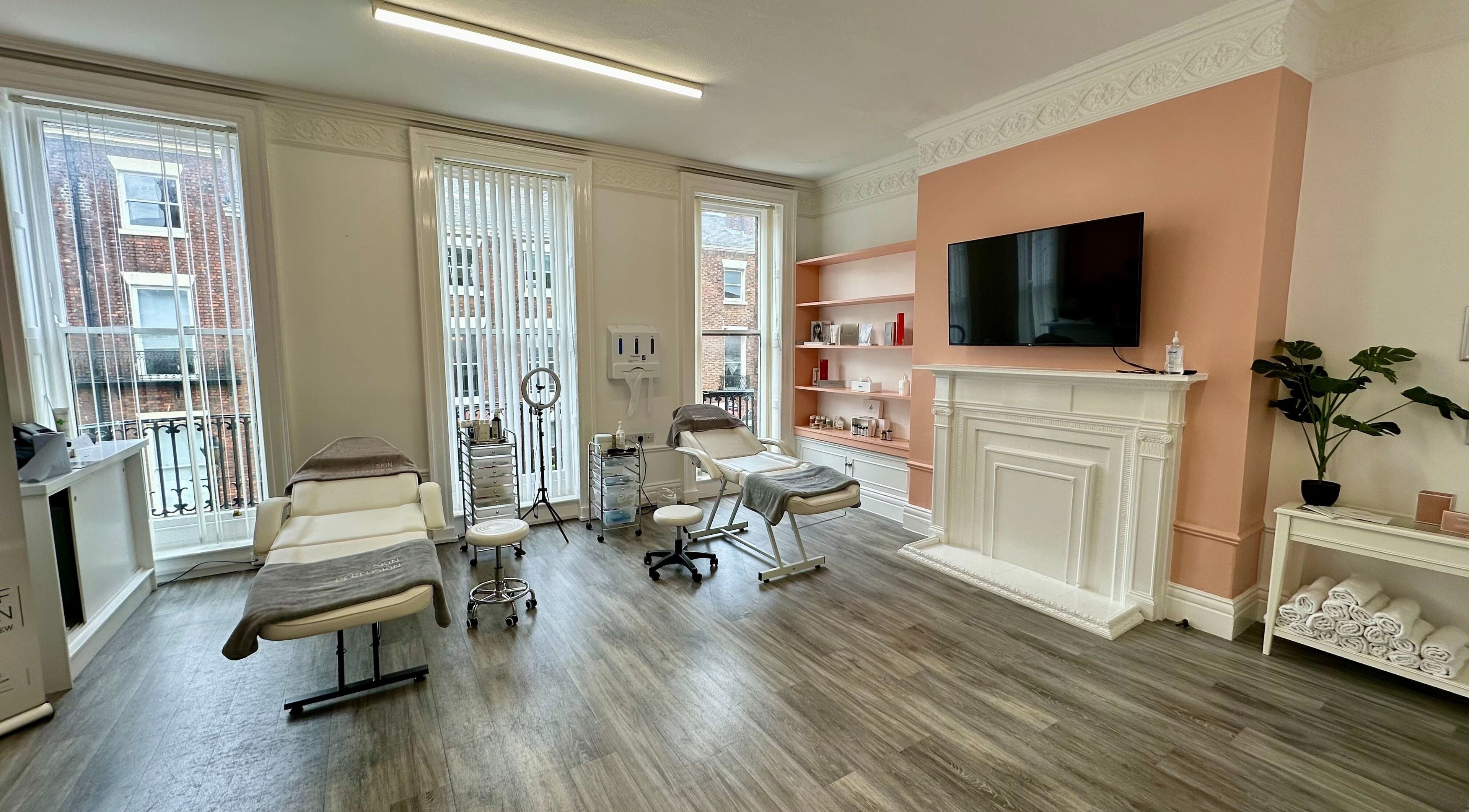 Bright treatment room at Perfectly You Co - Rodney Street, City Centre, Liverpool, England, GB with cozy decor and equipment.