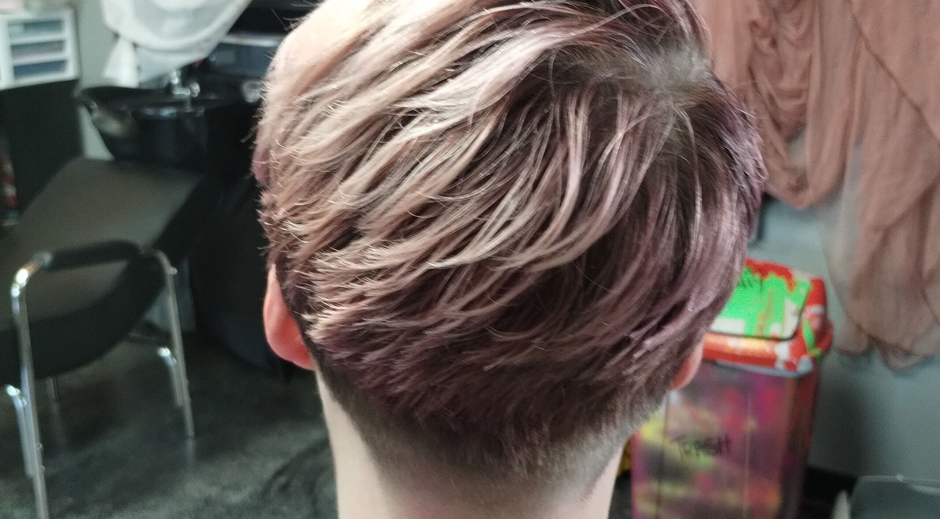 Close-up of elegant hairstyle at Snow White Fades and Pigment Studios in Emporia, Kansas, US