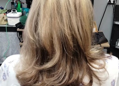 Blonde hair styled elegantly at Snow White Fades and Pigment Studios, Emporia, Kansas, US.