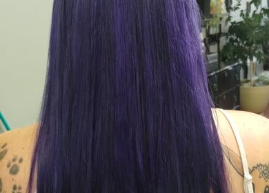 Vibrant purple hair transformation at Snow White Fades and Pigment Studios, Emporia, Kansas, US.