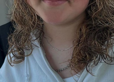 Closeup of a freshly styled curly hair at Snow White Fades and Pigment Studios, Emporia, Kansas, US.