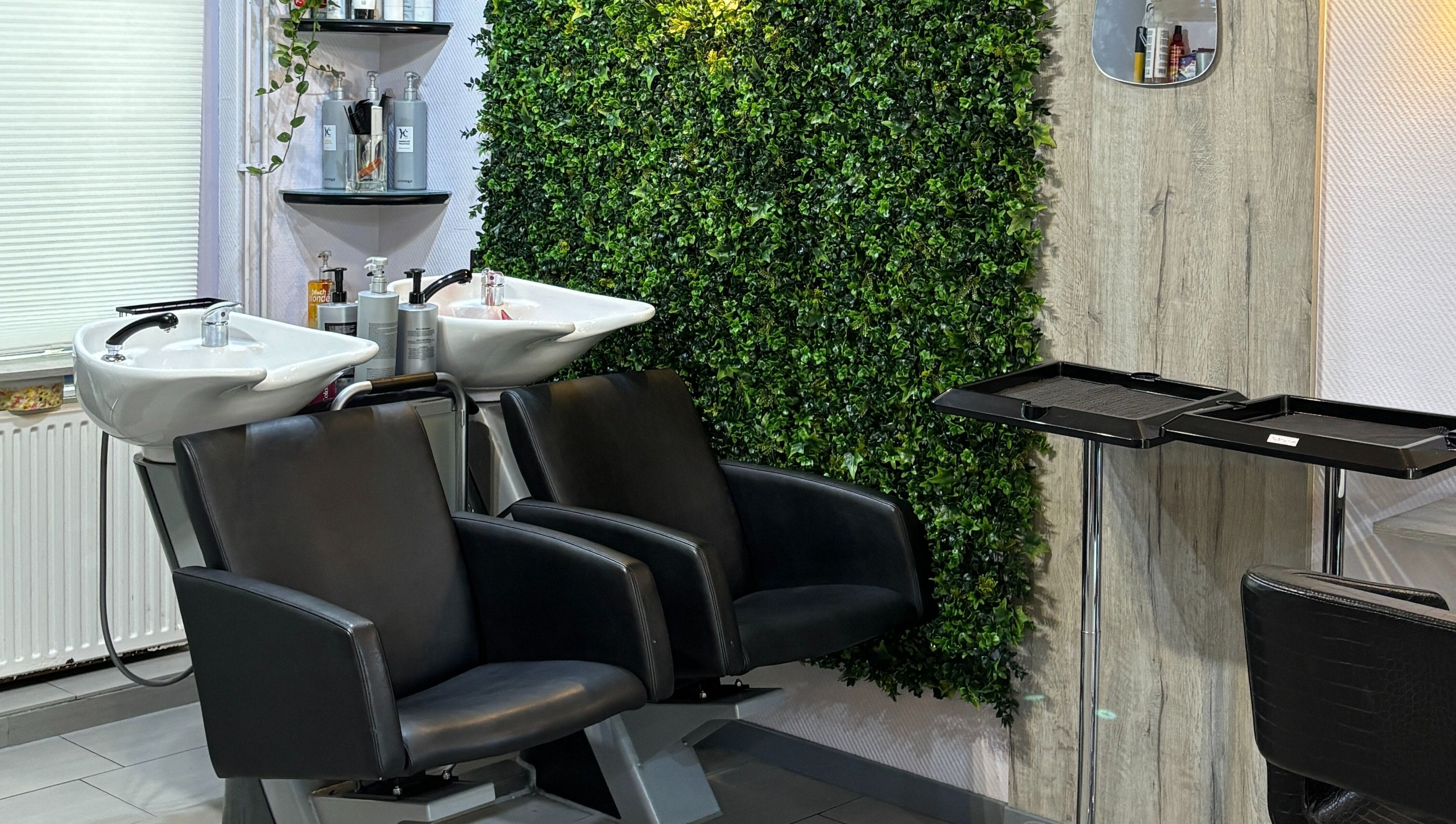 Luxurious wash stations at Anima Beauty, Amsterdam, Noord-Holland, NL, offering a tranquil salon experience.