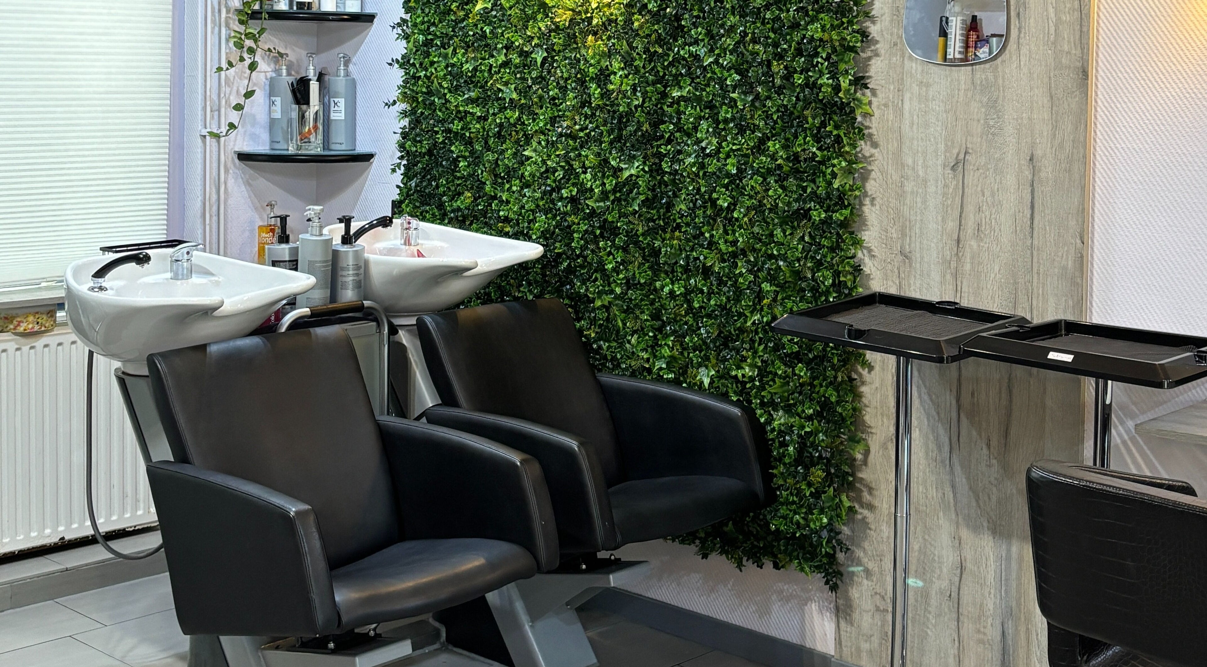 Luxurious wash stations at Anima Beauty, Amsterdam, Noord-Holland, NL, offering a tranquil salon experience.