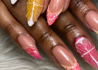 Colorful citrus-themed nail art at Lottiesnails, Windhoek, Khomas Region, NA showcasing stunning creativity.
