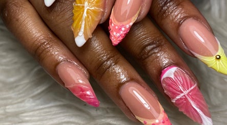 Colorful citrus-themed nail art at Lottiesnails, Windhoek, Khomas Region, NA showcasing stunning creativity.