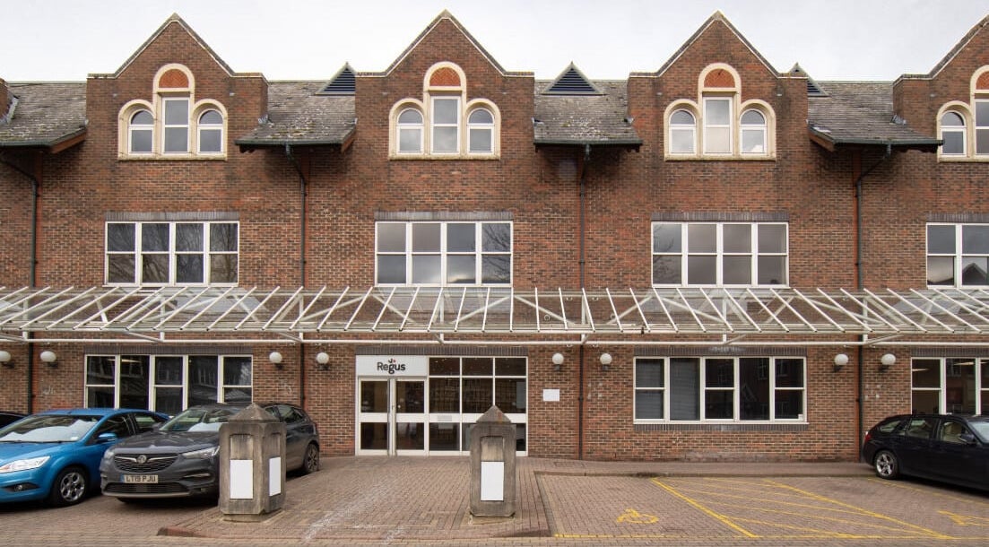 Front view of Gym & Tonic venue with elegant brick facade in St Albans, England, GB.