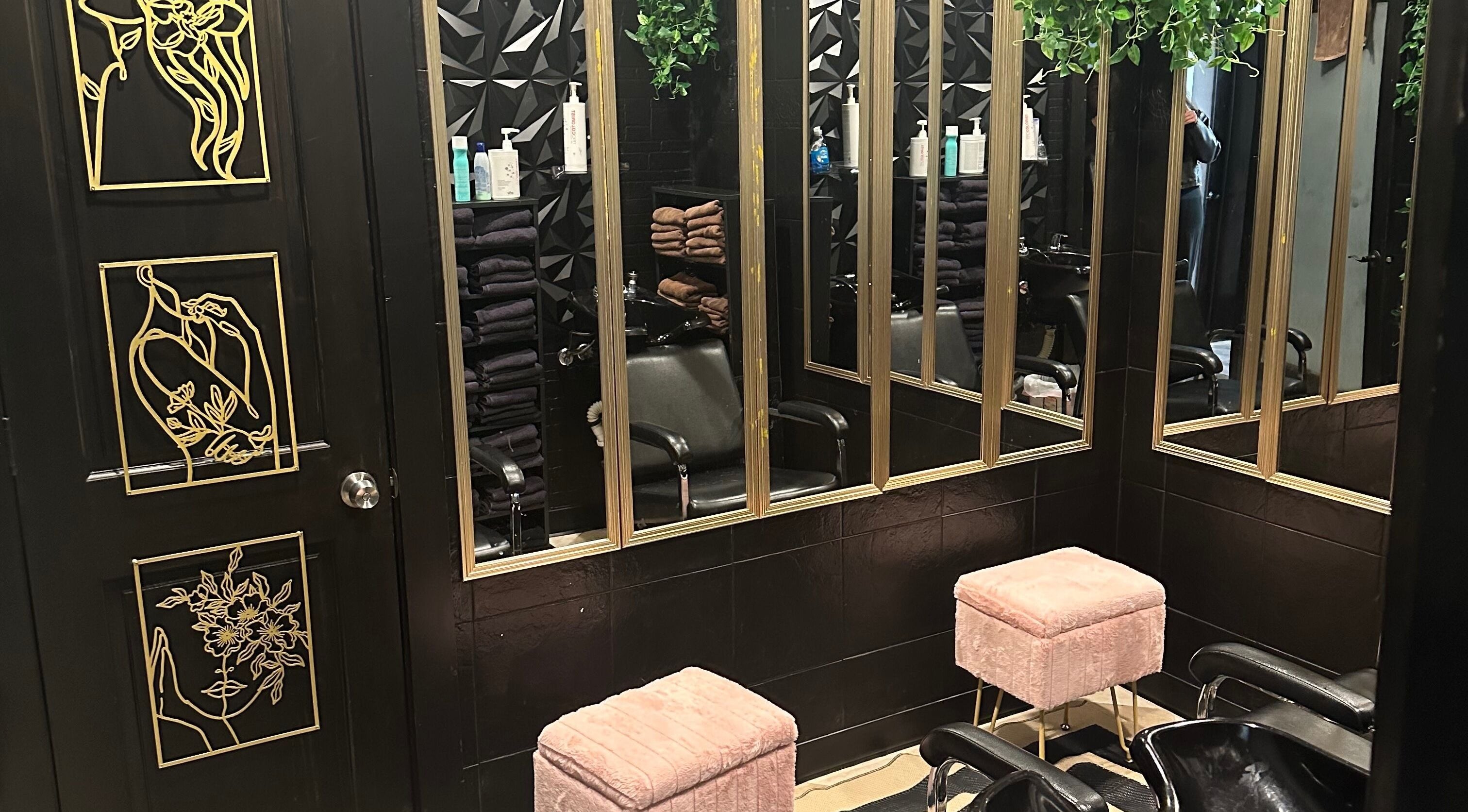 Elegant styling station at Salon Soiree, Denville, New Jersey; mirrors, chairs, and decor creating a modern vibe.