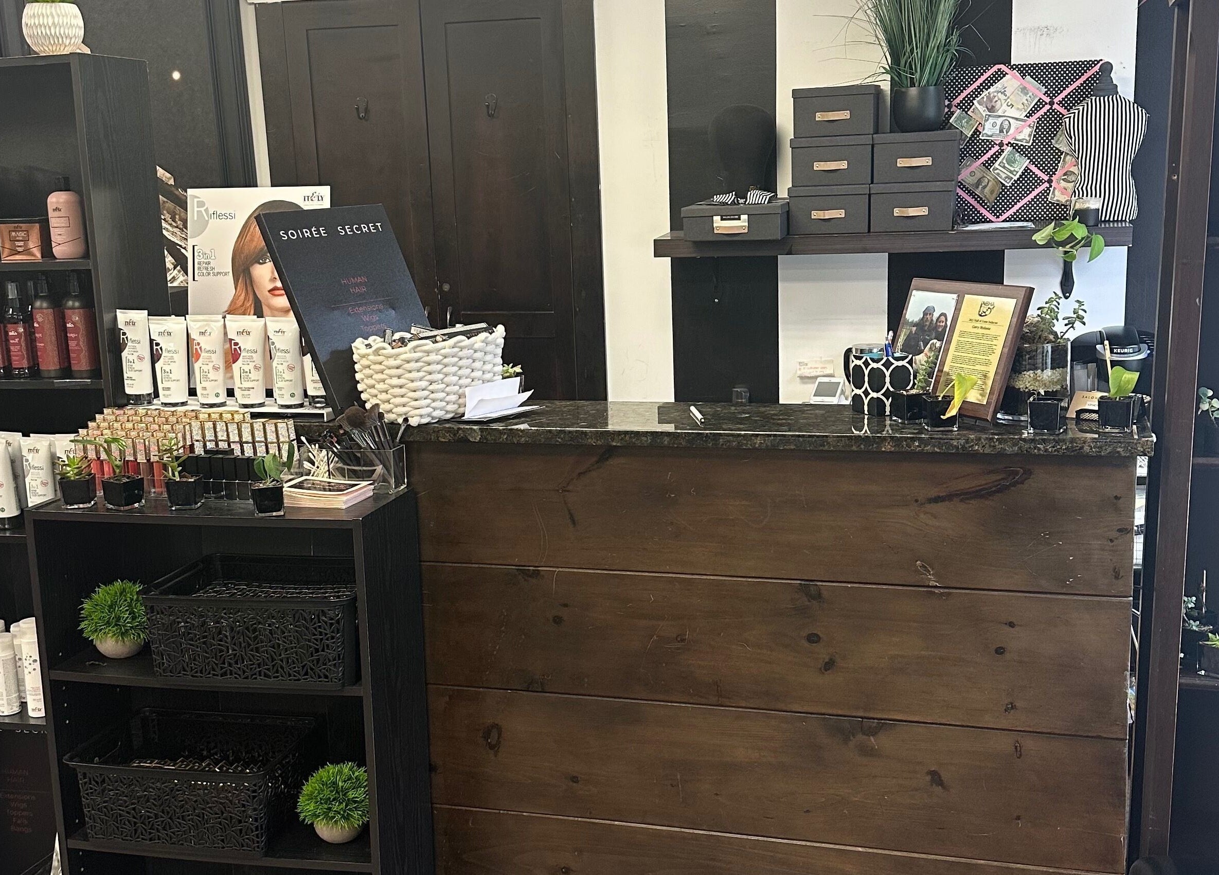 Salon Soiree reception area in Denville, New Jersey, US, featuring stylish product displays and decor.