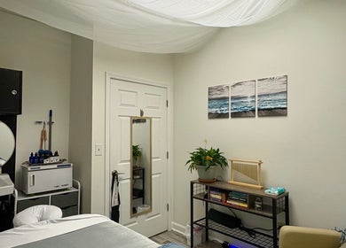 Serene massage room at Black Oasis Luxury Mind & Body in Conyers, Georgia, US, featuring calming decor.