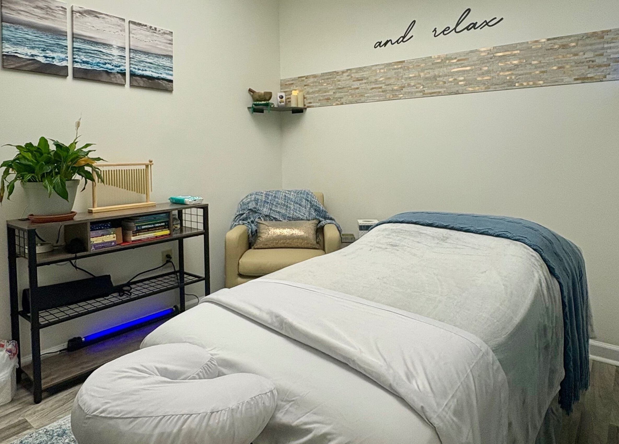 Tranquil massage room at Black Oasis Luxury Mind & Body in Conyers, Georgia, US with soothing decor and comfort.