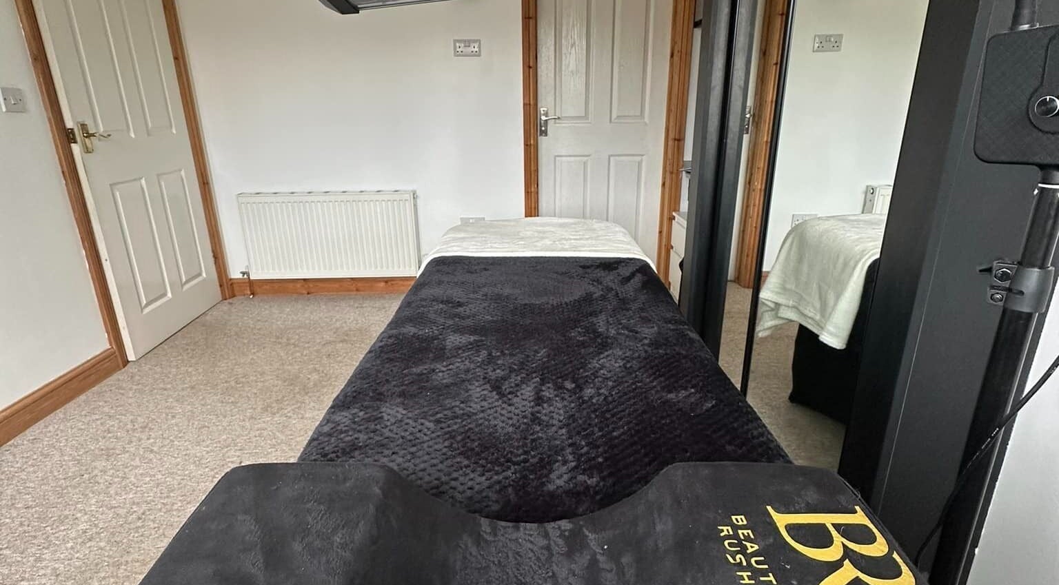 Relaxing treatment room at BeautyRush, Andover, England, GB. Warm tones and cozy ambiance for ultimate comfort.