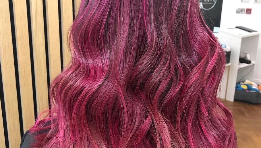Luscious pink wavy hair styled at Hair By Jemma Bollon, Harrogate, England, GB.