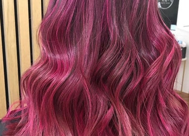 Luscious pink wavy hair styled at Hair By Jemma Bollon, Harrogate, England, GB.