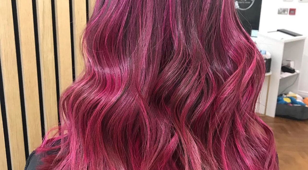 Luscious pink wavy hair styled at Hair By Jemma Bollon, Harrogate, England, GB.