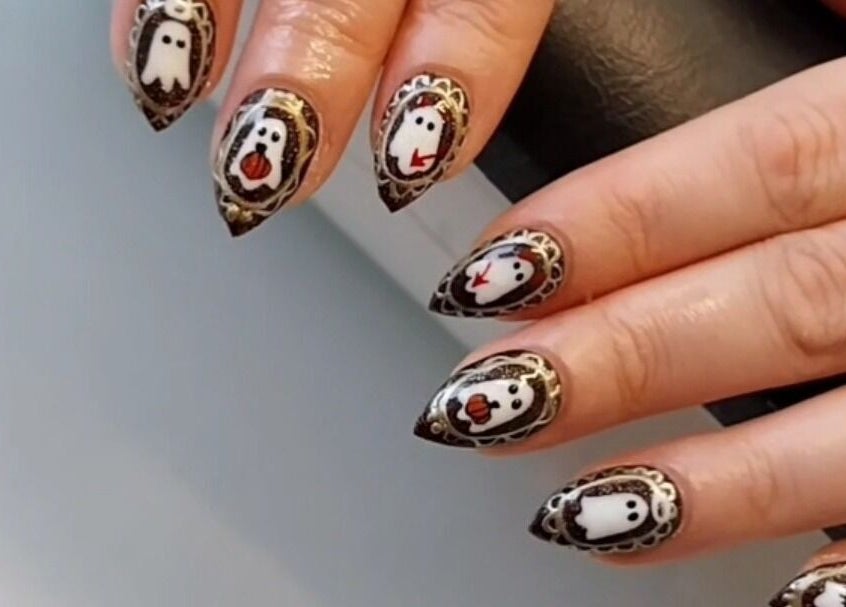 Halloween-themed nail art by Pearlescent Nails in Birmingham, England, GB featuring ghost designs.