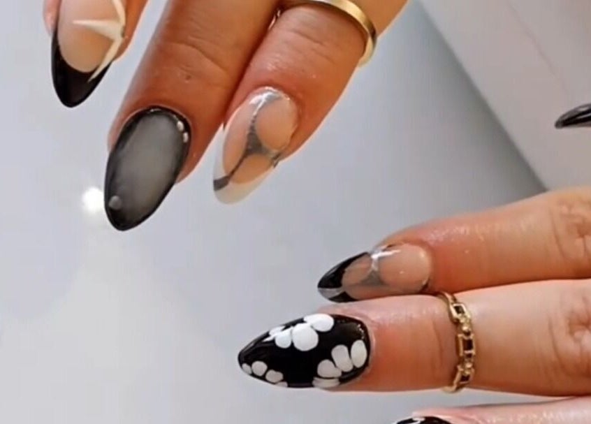 Elegant black and white nail art at Pearlescent Nails, Birmingham, England, GB.