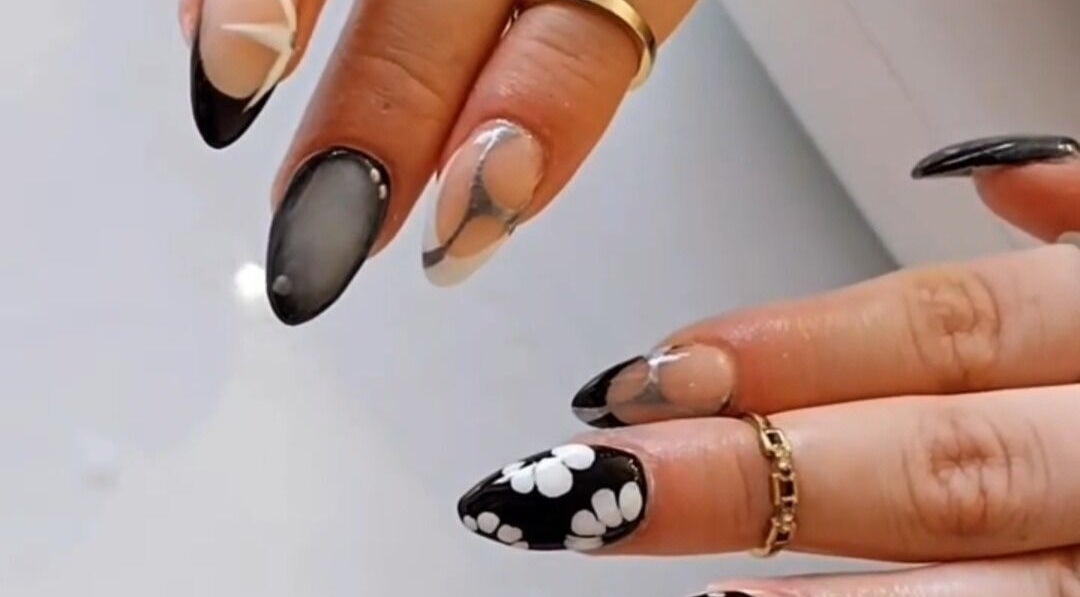 Elegant black and white nail art at Pearlescent Nails, Birmingham, England, GB.