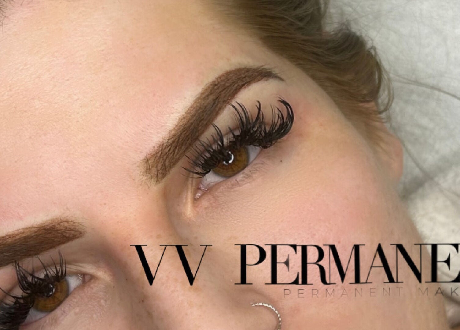 Close-up of enhanced eyebrows and lashes at VV Permanent Make Up - Sidcup, Sidcup, England, GB.