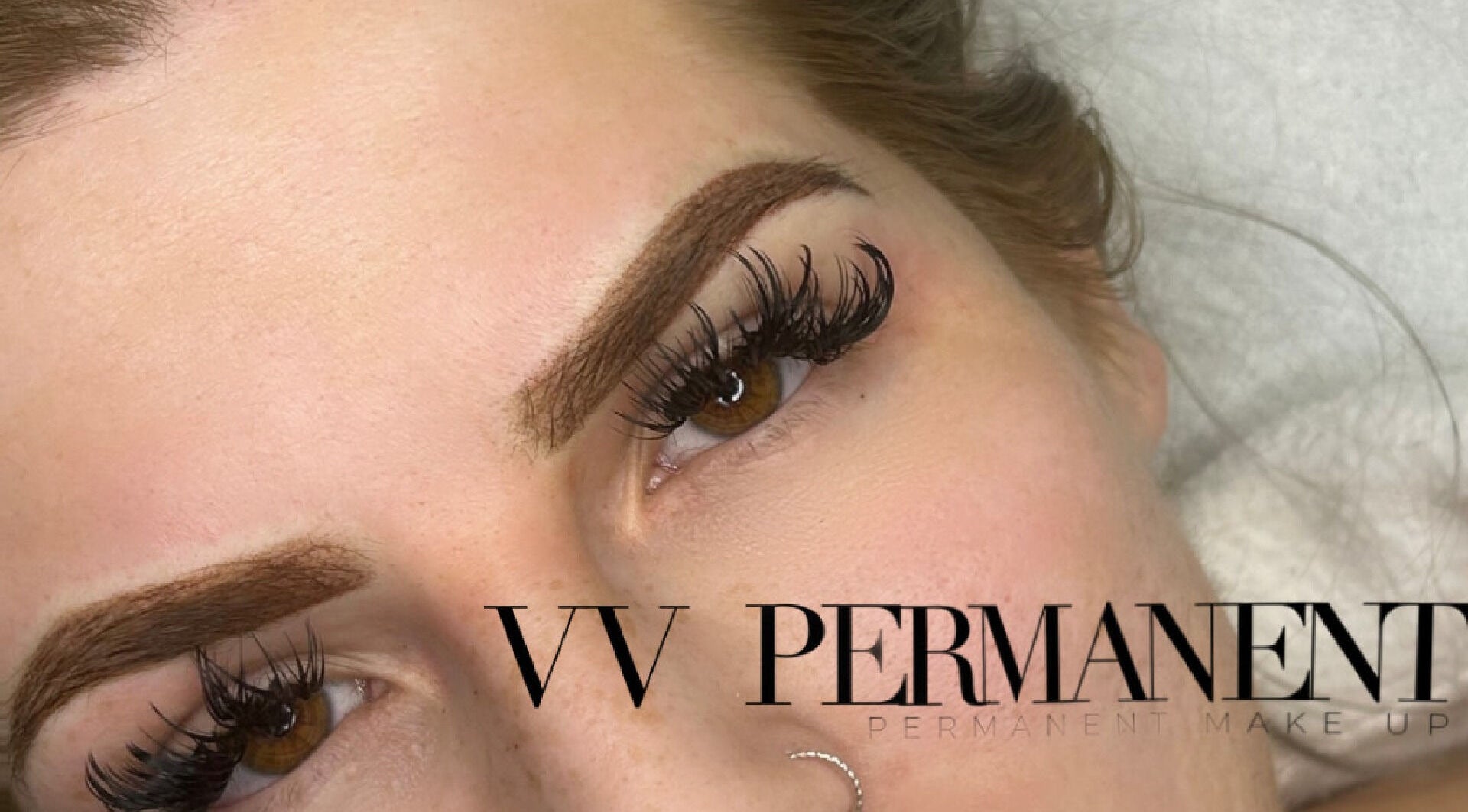 Close-up of enhanced eyebrows and lashes at VV Permanent Make Up - Sidcup, Sidcup, England, GB.